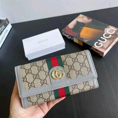 Carteras y monederos de Gucci .